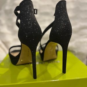 Black Glitter Strap Heels. Platform 0.78 with 4.72 heel. Wore once. Kept in box